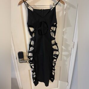 Elegant Black Backless Dress with Unique Cut-Outs